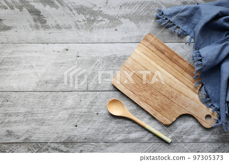wooden chopping board on wooden background top down wooden chopping board on wooden background top down 97305373
