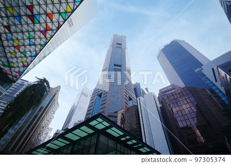 low angle view of singapore city buildings. low angle view of singapore city buildings. 97305374