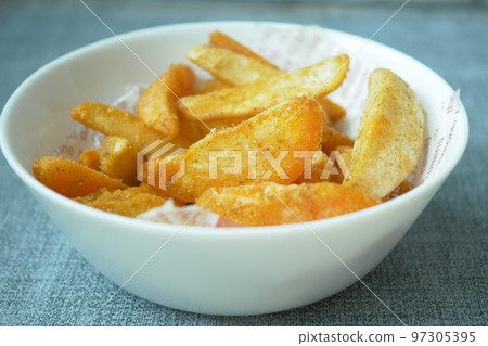 detail shot of French Fries on table  97305395