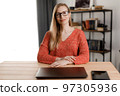 Women freelancing on laptop 97305936