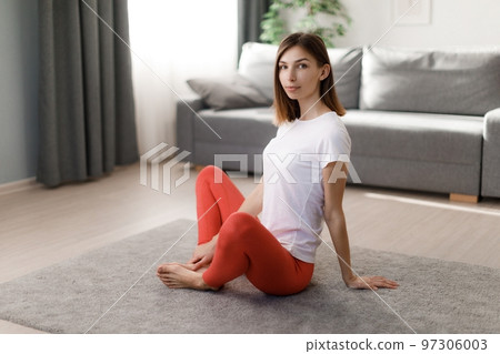 Sporty woman taking break Sporty woman taking break 97306003