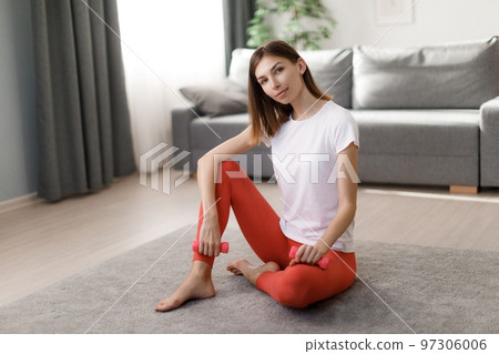 Fitness woman training at home Fitness woman training at home 97306006