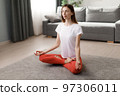 Woman meditating at home 97306011
