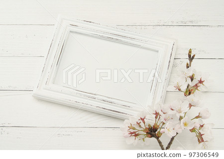Shabby chic white photo frame and cherry blossom Shabby chic white photo frame and cherry blossom 97306549
