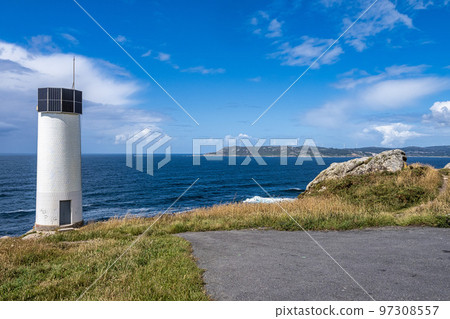 Lighthouse at Cape Laxe on the coast of death, Galicia in Spain Lighthouse at Cape Laxe on the coast of death, Galicia in Spain 97308557