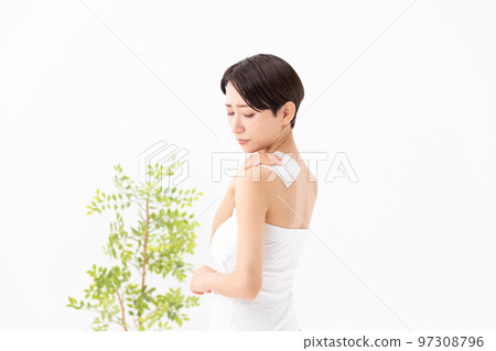 Woman applying poultice white background 97308796
