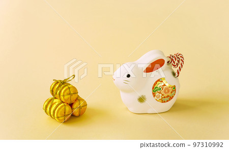 Japanese New Year material. zodiac rabbit on yellow background 97310992
