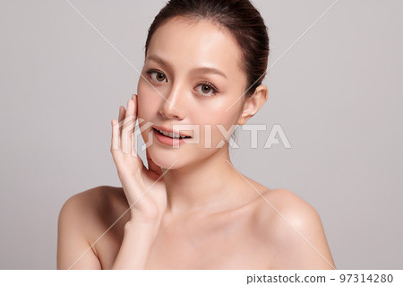 Beautiful young asian woman with clean fresh skin on grey background, Face care, Facial treatment, Cosmetology, beauty and spa, Asian women portrait. 97314280
