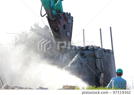 Demolition work using heavy machinery Concrete Demolition work using heavy machinery Concrete 97319302