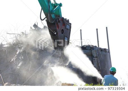 Demolition work using heavy machinery Concrete Demolition work using heavy machinery Concrete 97319304