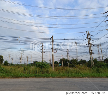 View of poles and power lines in Thailand View of poles and power lines in Thailand 97320194