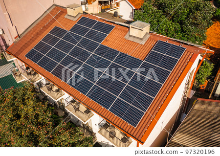 Solar panels on the roof of the house. Aerial view Solar panels on the roof of the house. Aerial view 97320196