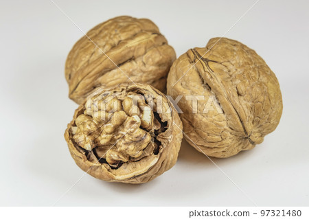 close up ripe and shelled walnuts close up ripe and shelled walnuts 97321480