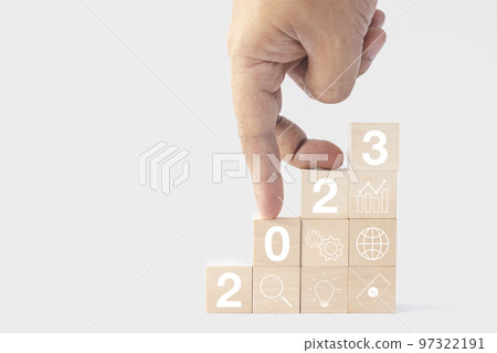 2023 business growing growth concept to success. fingers are walking down woods block step with icon concept about business strategy, Action plan, Goal and target, hand stack, project, vision. 2023 business growing growth concept to success. fingers are walking down woods block step with icon concept about business strategy, Action plan, Goal and target, hand stack, project, vision. 97322191
