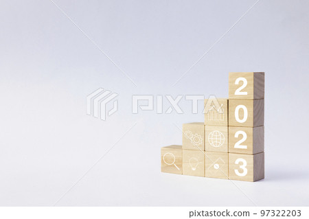 2023 business growing growth concept to success. woods block step with icon concept about business strategy, Action plan, Goal and target, hand stack, project, vision. 97322203