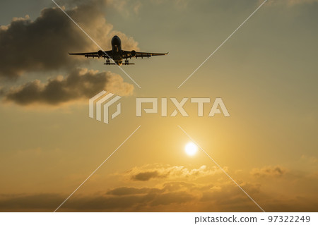 sun and sunset with aircraft landing sun and sunset with aircraft landing 97322249