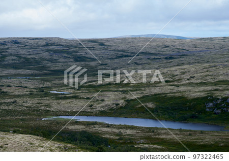 Summer landscape with hills and lakes on a cloudy day 97322465