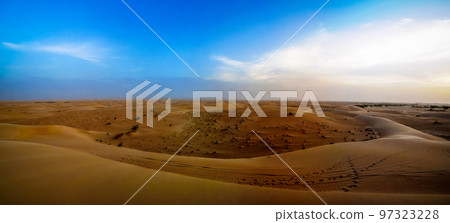 Sunset view to Sahara dune near Chinguetti in Mauritania Sunset view to Sahara dune near Chinguetti in Mauritania 97323228