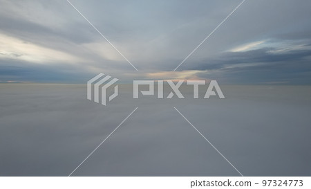 A heavenly ocean of clouds. Flying on a drone. 97324773