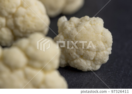 Cauliflower close up during cooking, fresh raw cauliflower Cauliflower close up during cooking, fresh raw cauliflower 97326411