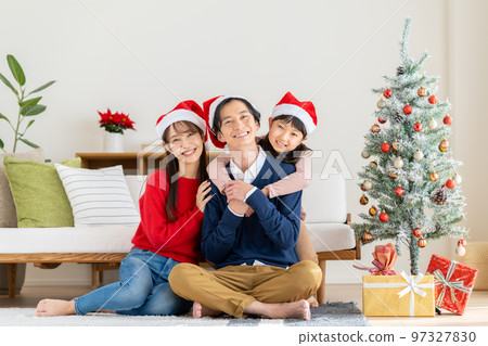 young family at christmas young family at christmas 97327830