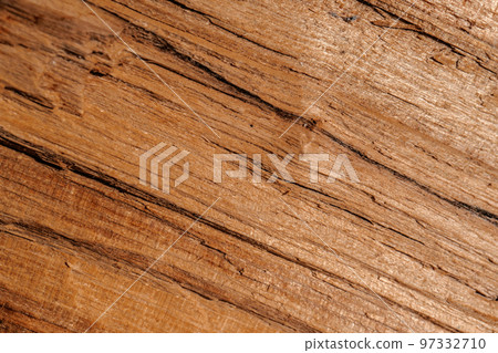 The texture of untreated old wood with cracks. 97332710