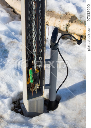Set of bicycle repair tools outdoors closeup 97332990