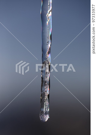 icicles are melting in colorful light icicles are melting in colorful light 97333977