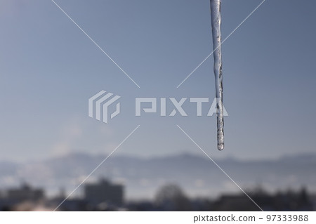 icicles are melting in colorful light 97333988