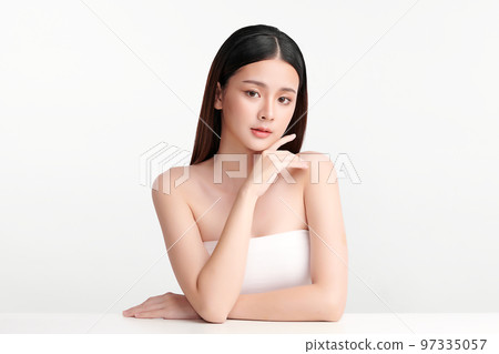 Beautiful young asian woman with clean fresh skin on white background, Face care, Facial treatment, Cosmetology, beauty and spa, Asian women portrait. Beautiful young asian woman with clean fresh skin on white background, Face care, Facial treatment, Cosmetology, beauty and spa, Asian women portrait. 97335057