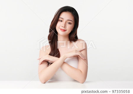 Beautiful young asian woman with clean fresh skin on white background, Face care, Facial treatment, Cosmetology, beauty and spa, Asian women portrait. Beautiful young asian woman with clean fresh skin on white background, Face care, Facial treatment, Cosmetology, beauty and spa, Asian women portrait. 97335058