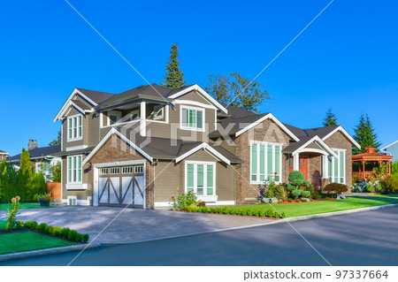 Residential house with summer canopy on site and entrance under the porch 97337664