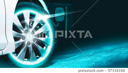 EV electric vehicle parked with a blue neon light on the wheels EV electric vehicle parked with a blue neon light on the wheels 97338398