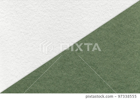 Texture of craft white and green paper background, half two colors, macro. Structure of vintage kraft olive cardboard 97338555