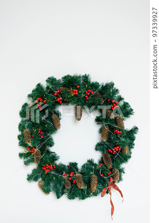 Christmas wreath on a white background with copying space 97339927