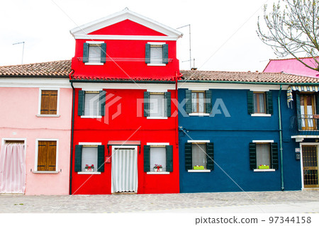 Burano Venice Red house and blue house Burano Venice Red house and blue house 97344158
