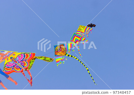 Kites on the beachin summer. Rimini, Italy Kites on the beachin summer. Rimini, Italy 97348457