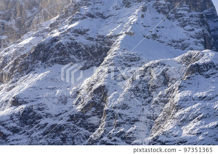 rock face of a mountain in winter rock face of a mountain in winter 97351365