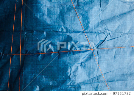 Blue crumpled synthetic fabric. Blue crumpled synthetic fabric. 97351782