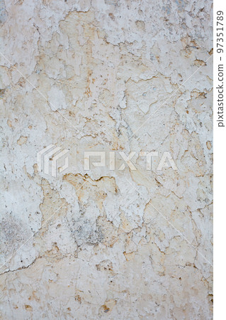 Old whitewashed wall with rich texture 97351789