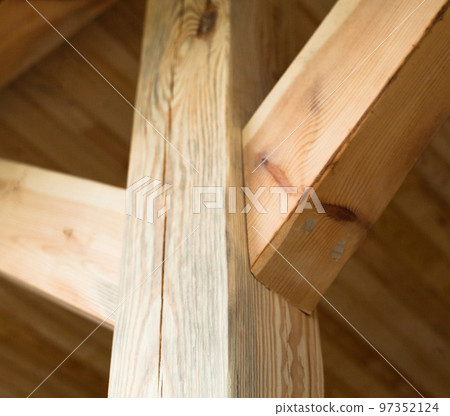 Wooden post with struts. Wooden post with struts. 97352124