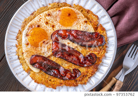 Hash brown with egg and bacon 97353762