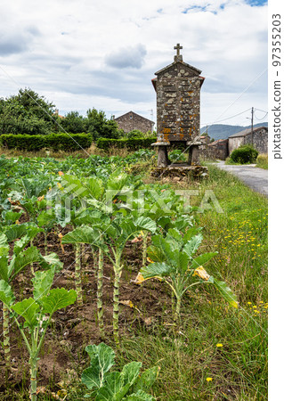 Beautiful village of Fisterra in Spain, unique for its horreos, traditional granary barns 97355203