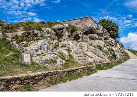 Finisterre Cape Lighthouse, Costa da Morte, Galicia, Spain. End of Saint James Way. 97355211