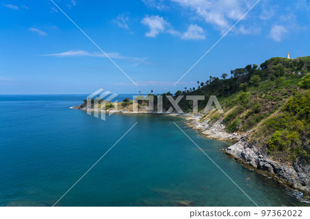 Promthep Cape is one of the most photographed locations in Phuket. Phromthep cape viewpoint at blue sea sky in Phuket, Thailand. 97362022