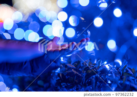 illumination and child's hand illumination and child's hand 97362232