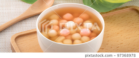 Red and white tangyuan with syrup soup. Red and white tangyuan with syrup soup. 97368978