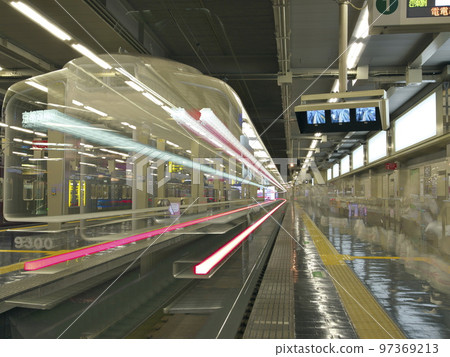 Train leaving Osaka Umeda Station 97369213
