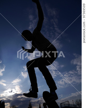 silhouette skateboarder shadow tricks outside 97369509