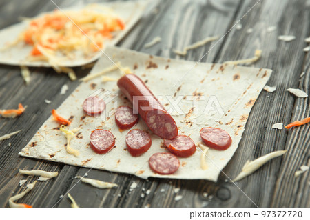 preparation of Shawarma. ingredients on wooden table.photo with copy space preparation of Shawarma. ingredients on wooden table.photo with copy space 97372720